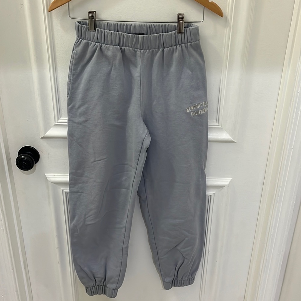 Brandy Melville -Perwinkle sweatpants w/ pockets and Newport Beach, CA detail